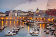 Fishing boats at sunset in the Old Port, Dubrovnik Old Town, Dalmatian Coast, Dubrovnik, Croatia, EU, Europe