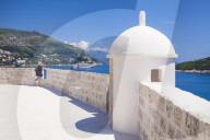 Old City walls and view of coast, Dubrovnik Old Town, Dalmatian Coast, Dubrovnik, Croatia, EU, Europe
