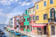 Brightly coloured fishermans cottages on the island of Burano in the Venice lagoon, Venetian lagoon, Italy, EU, Europe
