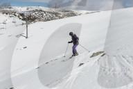 Young skier skiing The Chute, Mt Hotham, Victoria.