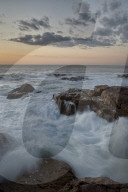 Surf along the rocky coast at sunset, Elands Bay, South Africa