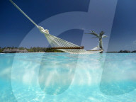Hammock in the lagoon at Gili Lankanfushi Resort, Maldives