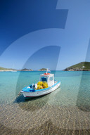 Fishing boat moored on the beach, Patmos Island, Greece