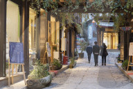 People walking through street, Lijiang (UNESCO World Heritage Site), Yunnan, China