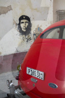 Vintage 1946 Ford with Wall Mural of Che Guevara, Centro Habana, Havana, Cuba