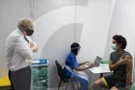 Prime minister Boris Johnson visits vaccine centre