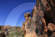 Climber on cliffs in the Cederberg mountains, Western Cape, South Africa