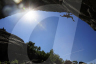 A climber scales a difficult route in the Hanshallaren Cave, Flatanger, Norway