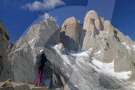 A mountaineer looks up towards Cerro Fitz Roy, El Chalten Massif, Patagonia, Argentina