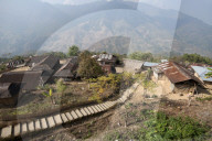 Recently constructed concrete steps to ease access between higher and lower sections of village on steep Naga hillside, Nagaland