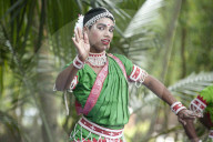 Young boy performimg Gotipua dance, the traditional folk dance of Odisha inspired by Hindu gods, Lords Jagannath and Krishna