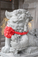 Taoist temple. Nghia An Hoi Quan pagoda. Imperial guardian lion.
