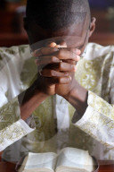 Sunday morning catholic mass. Prayer. Lome. Togo.