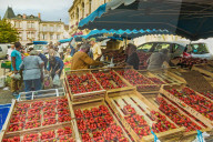Strawberry stall in town hall square on market day in this old bastide town. Sainte-Foy-la-Grande; Gironde; Aquitaine; France