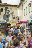 Busy Rue de L'Engin on popular Thursday market day at this pretty south western bastide town. Eymet; Bergerac; Dordogne; France