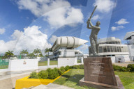 Garfield Sobers statue and The Kensington Oval Cricket Ground, Bridgetown, St. Michael, Barbados, West Indies, Caribbean, Central America