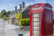 Red Telephone Box in Beeley Village in Springtime, Derbyshire Dales, Derbyshire, England, UK, Europe