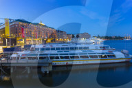 The Grand Hotel and sightseeing boats at dusk, Stockholm, Sweden, Scandinavia, Europe