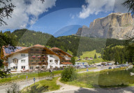 Hotel Lupo Bianco Wellness & Walking Canazei, Passo Pordoi with mountain backdrop, South Tyrol, Italian Dolomites, Italy, Europe