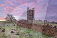 Broadway Tower and cotswold drystone wall at sunrise, Broadway, Cotswolds, Worcestershire, England, United Kingdom, Europe
