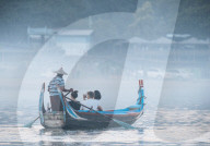 Tourist boats enjoying view of U-Bein Bridge at Sunset, Mandalay, Mandalay Region, Myanmar