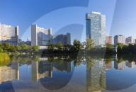 Austria, Vienna, UNO City, United Nations buildings reflecting in lake