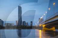 Austria, Vienna, Donau City and DC building reflecting in New Danube River