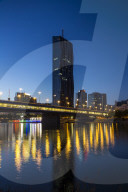 Austria, Vienna, Donau City and DC building reflecting in New Danube River