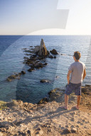 Arrecife de Las Sirenas rocky outcrop at sunset, Cabo de Gata-Nijar Natural Park, Andalucia, Almeria, Spain
