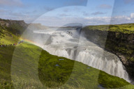 Tourists visiting iconic Gullfoss, Golden Falls, Olfusa River in southwest Iceland.