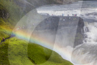 Tourists visiting iconic Gullfoss, Golden Falls, Olfusa River in southwest Iceland.