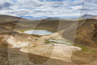 View of the 300 meter deep crater called VÃ­ti off the north coast of Iceland.