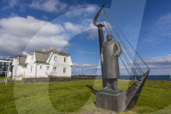 A statue of Einar Benediktsson near the HoÌˆfÃ°i House in ReykjavÃ­k, Iceland.