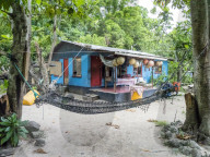 Village home on the small island of Dravuni, Kadavu Group, Republic of Fiji.