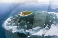 Aerial view of the Cloud surfing break at Tavarua, near Viti Levu, Republic of Fiji.