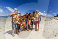 Local children greeting visitors on Vele Beach, Futuna Island, French Territory of Wallis and Futuna Islands.