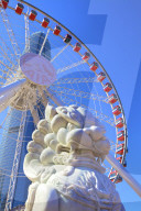 Chinese Guardian Lion With The Hong Kong Observation Wheel And IFC Building, Hong Kong, China, South East Asia