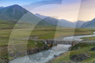 Wooden bridge over a Mountain river, Naryn gorge, Naryn Region, Kyrgyzstan