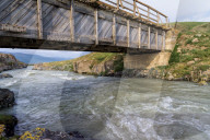Wooden bridge over a Mountain river, Naryn gorge, Naryn Region, Kyrgyzstan