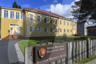 Russian Bishop's House, built 1843 in Sitka spruce, Sitka National Historical Park sign, rare sunny day, Southeast Alaska, USA