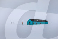 Damoy Hut, expedition ship visitor in the snow, Historic Monument, Dorian Bay, Wiencke Island, Antarctic Peninsula, Antarctica