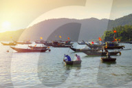 Fishermen in traditional round basket coracle boats on Cham Island