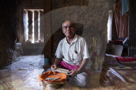 Fortune teller in the interior of an old Khmer temple on Chi Sor Mountain in Takeo