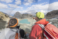 Hikers at Lej Lagrev during summer, Silvaplana, canton of GraubÃ¼nden, Engadine, Switzerland
