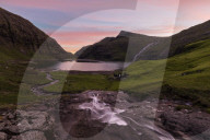 Sunset on lagoon surrounded by mountains, Saksun, Streymoy Island, Faroe Islands