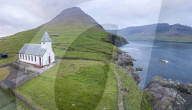 Panoramic of Church of Vidareidi by the sea, Vidoy island, Faroe Islands, Denmark