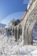 Bernina Express train on Landwasser Viadukt, Filisur, Albula Valley, Canton of GraubÃ¼nden, Switzerland