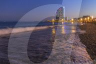 La Barceloneta Beach and the W Barcelona hotel in the background, Barcelona, Catalonia, Spain