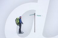 Photographer on snowshoes, Pallas-Yllastunturi National Park, Muonio, Lapland, Finland