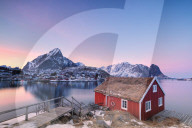 Sunset on fishermen's cabin (Rorbu), Reine, Lofoten Islands, Norway